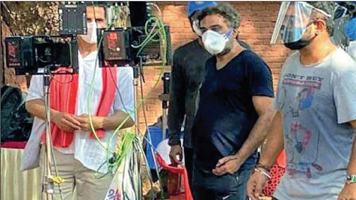  Actors and technicians sport masks during shooting of a film &nbsp;