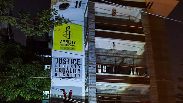 Amnesty India forced to halt operations, alleges “Witch-Hunt” by Modi govt