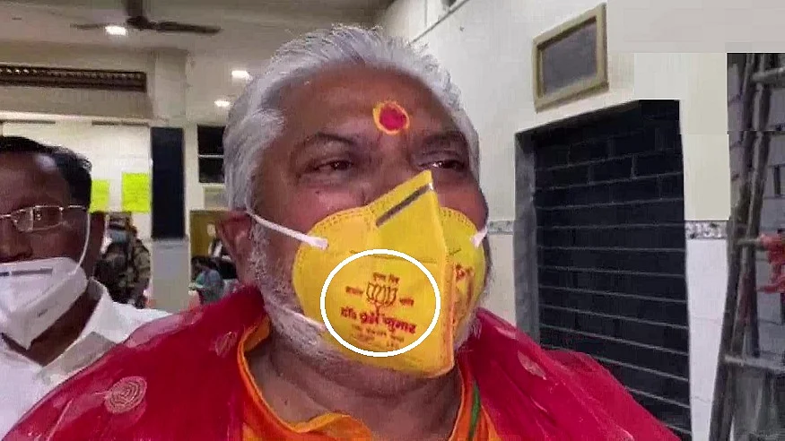 Bihar Minister Prem Kumar in trouble for wearing lotus mask