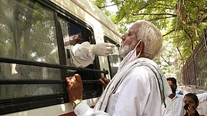 After months of denial, govt finally admits community transmission