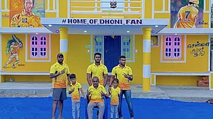 Adorable! Dhoni fan paints his home yellow, Thala’s portrait on wall
