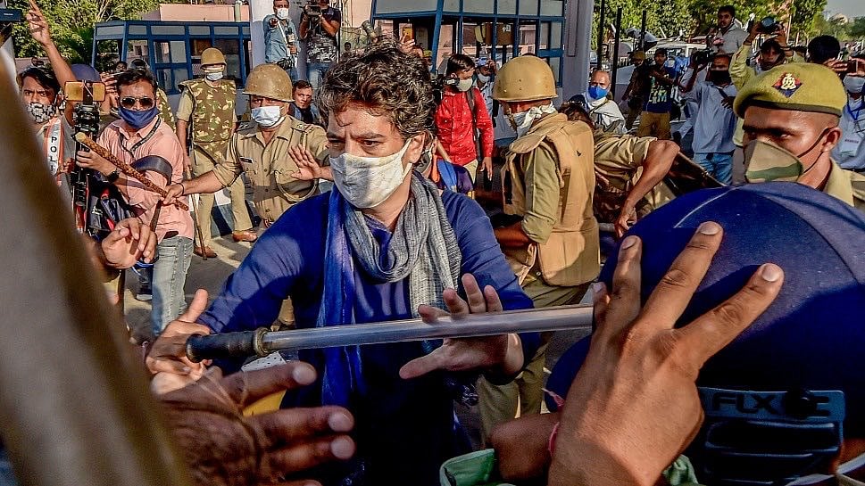 WATCH: Priyanka Gandhi shields Congress worker from lathi charge at DND  