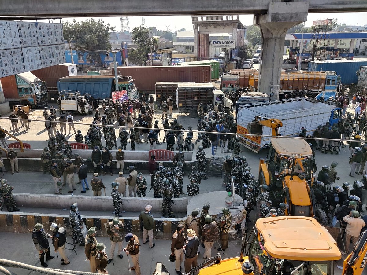 Protest against farm laws: Delhi Police use tear gas, water cannons to push back farmers