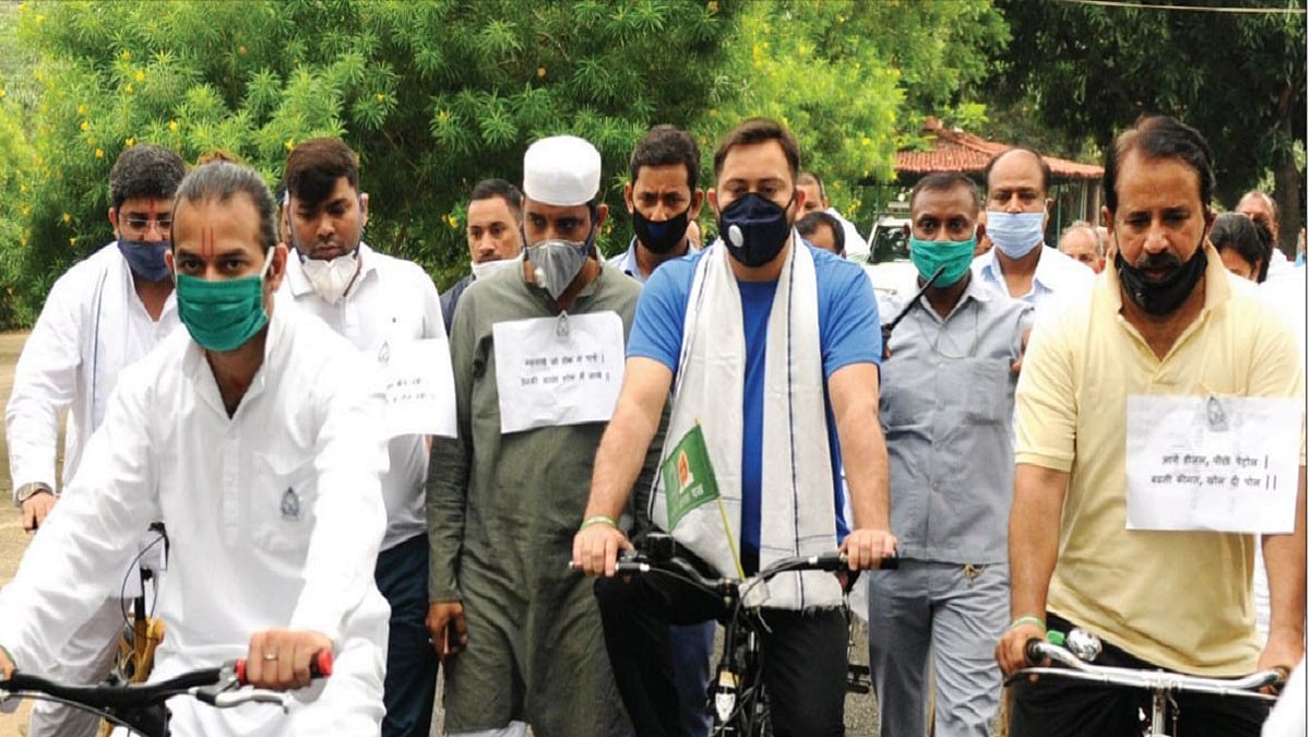 Tejashwi Yadav participating in a bicycle rally 