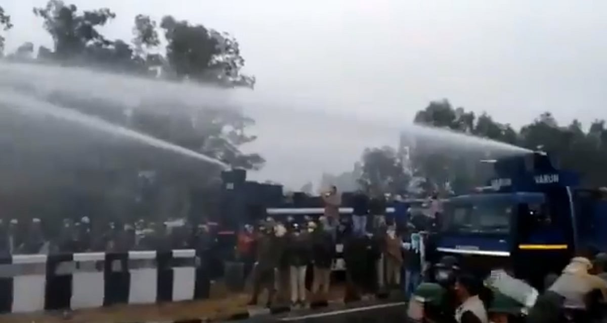 Braving tear-gas shells, water cannons, thousands break barricades in Haryana