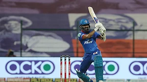 Delhi Capitals grab top-two finish with six-wicket win, RCB also through to playoffs