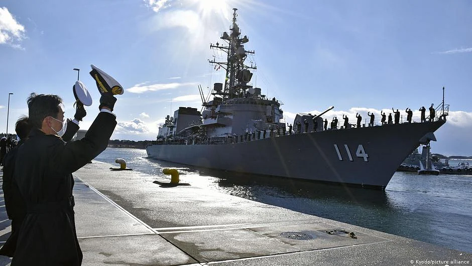 Japan Cabinet approves record defense budget.