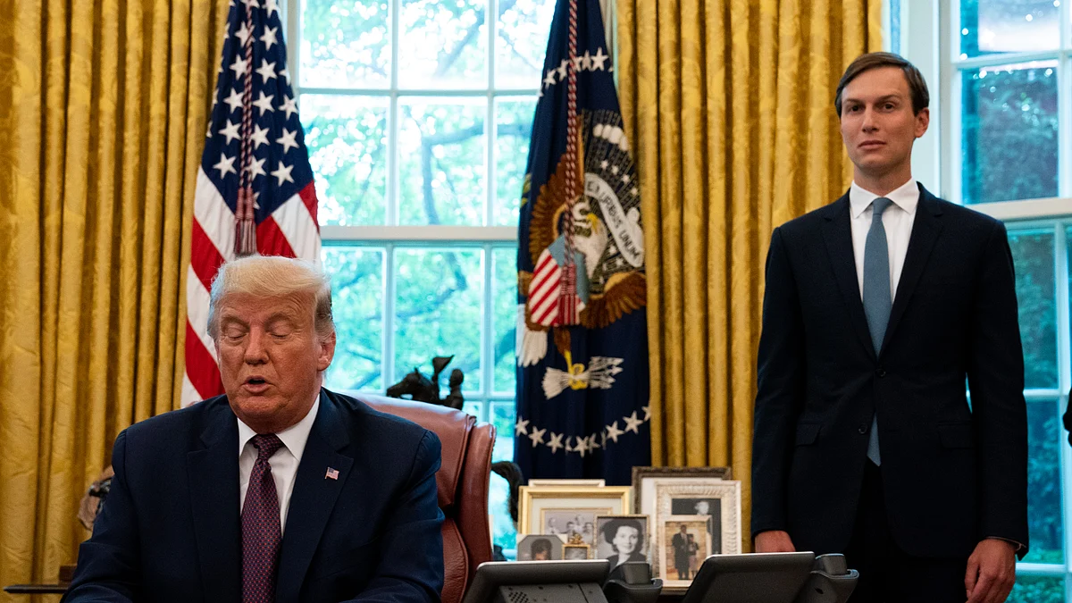 Advisor Jared Kushner and U.S. President Donald Trump (Photo by Anna Moneymaker-Pool/Getty Images)