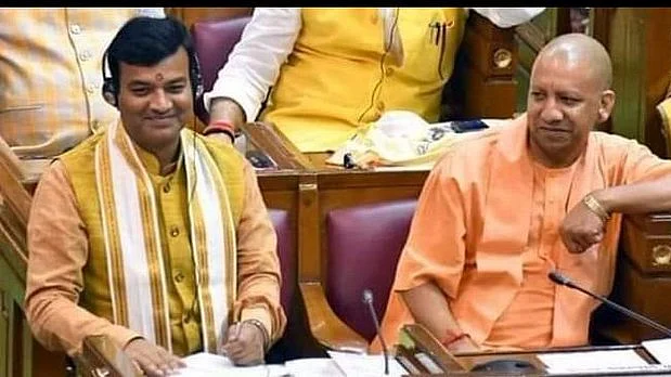 UP minister Anand Swarup Shukla with UP CM Yogi Adityanath&nbsp;