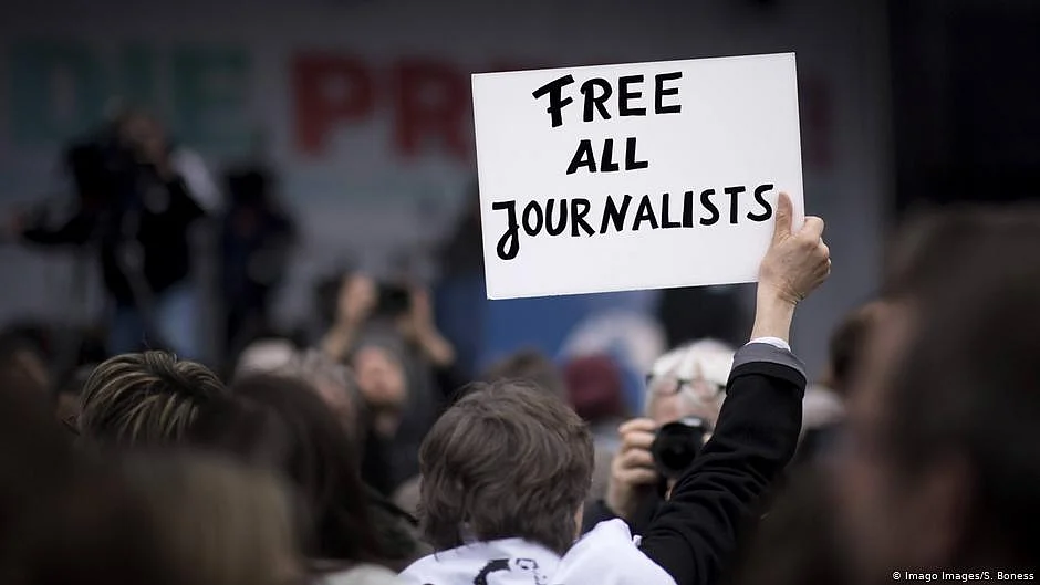 Representative Image of a poster that says 'Free All Journalists' (photo: DW)