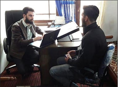 Tawfeeq Yusuf  of Bee Tech in his office