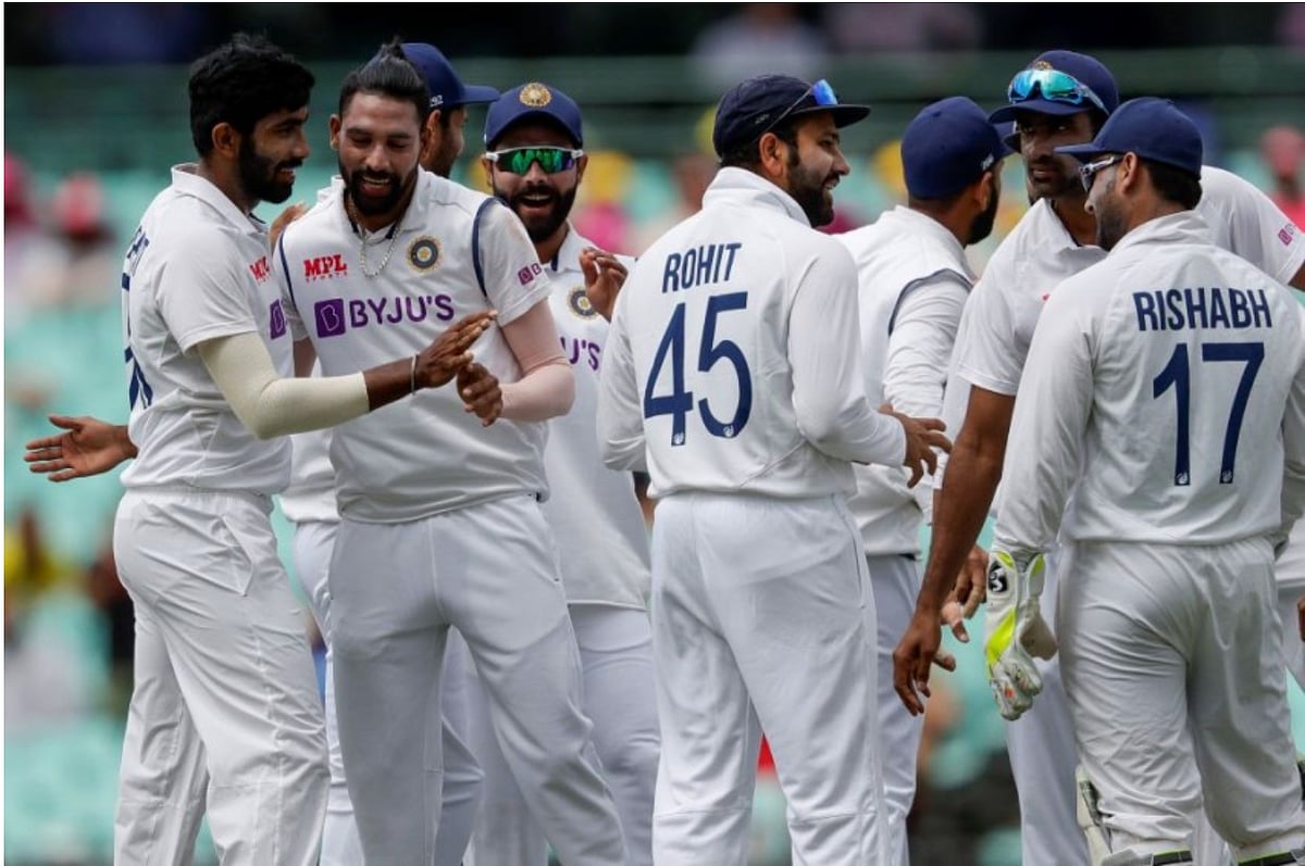 Rain stops play with Australia 21/1 after Siraj dismisses Warner