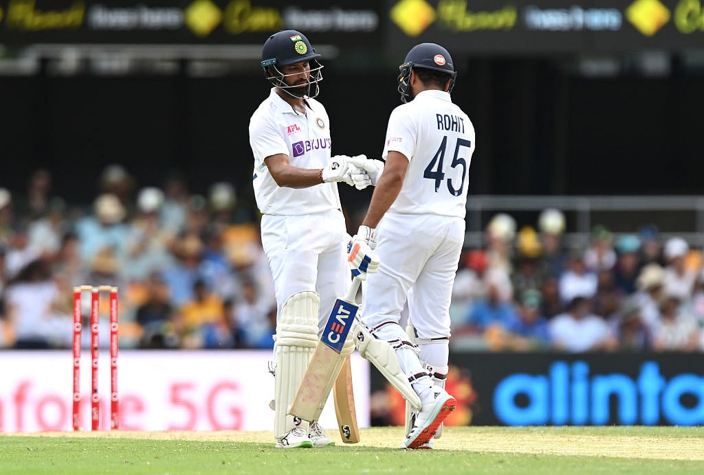 Cautious India lose Gill, Rohit to reach 62/2 at tea, Australia score 369 in 1st innings