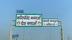 Protesting farmers affix ‘black laws’ banners on NH signboards