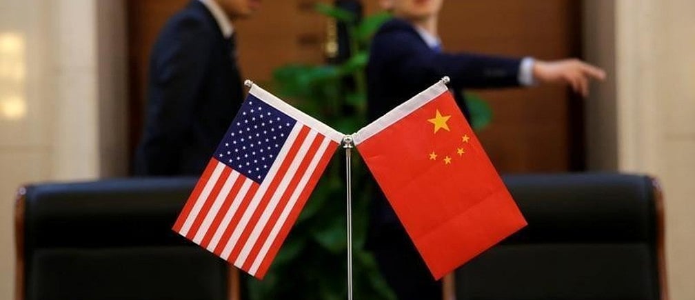 China urges US to lift trade restrictions, stop interference