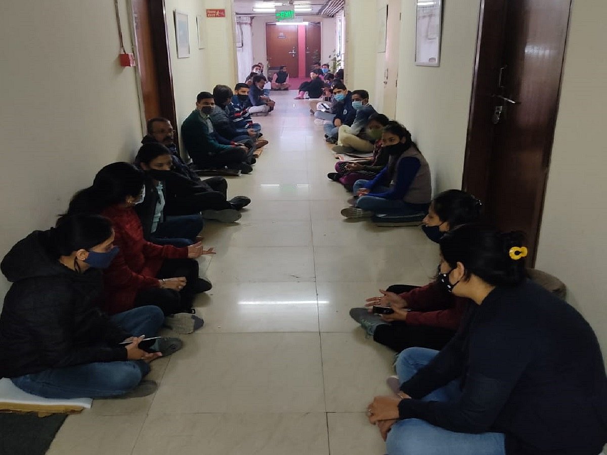 Multi-Skilled Staff (MSS) employees of South Asian University (SAU) demonstrate a sit-in protest in front of the SAU President’s office