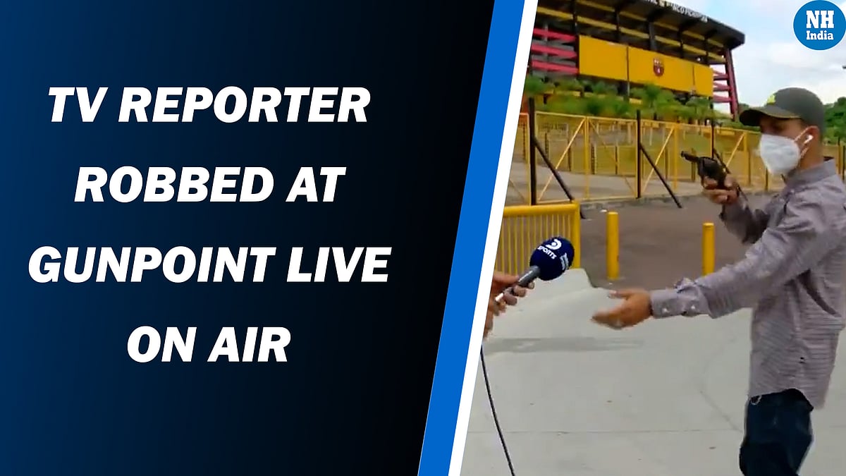 TV reporter robbed at gunpoint Live on Air 
