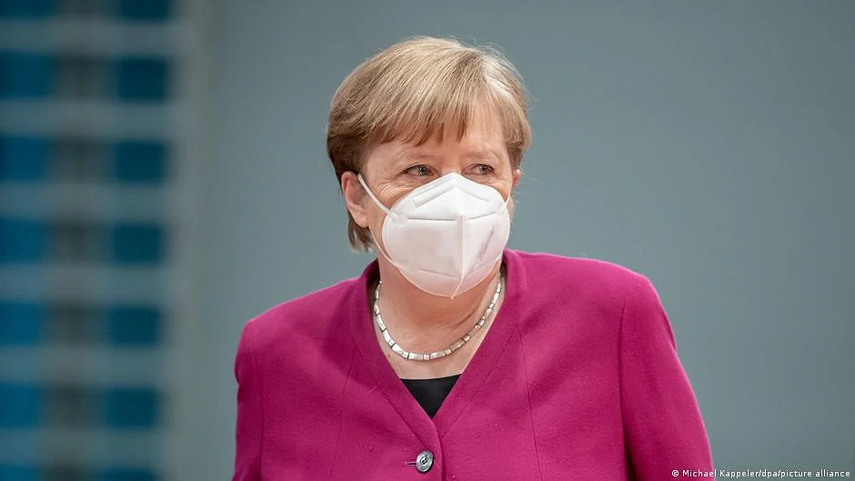Merkel urges premiers to stick to tighter curbs