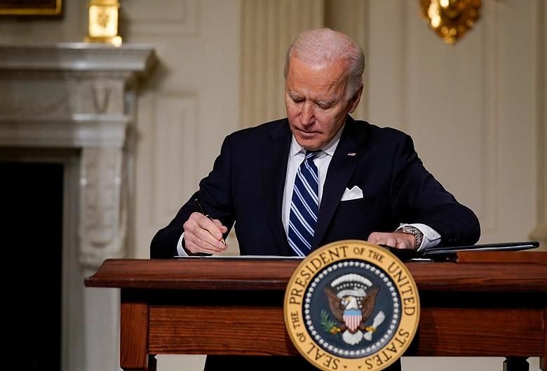 US President Joe Biden signs bill to address hate crimes against Asian-Americans