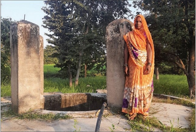 Kusuma at her well