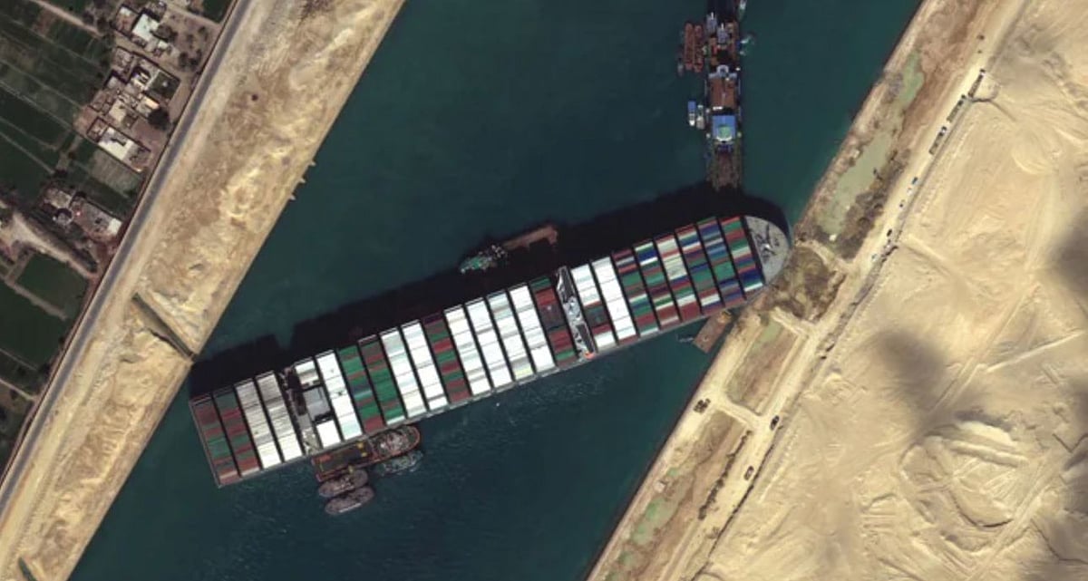 Container ship stuck in Suez Canal ‘partially refloated’