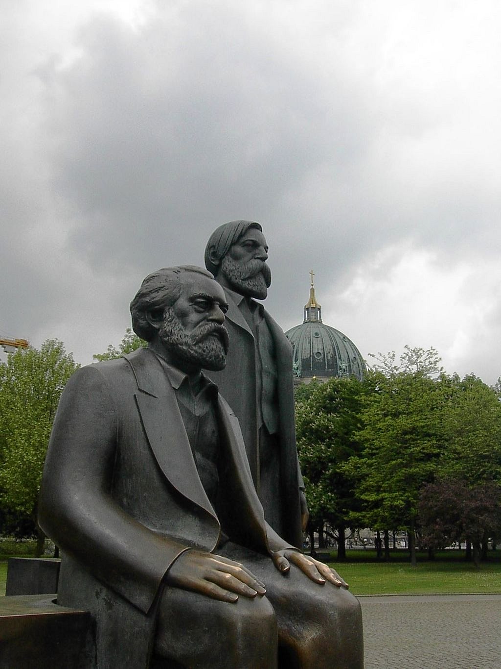 The statues of Karl Marx (foreground) and his collaborator Friedrich Engels in Marx-Engels-Forum in reunited Berlin, Germany