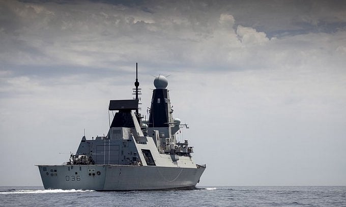Russia summons UK envoy over warship intrusion