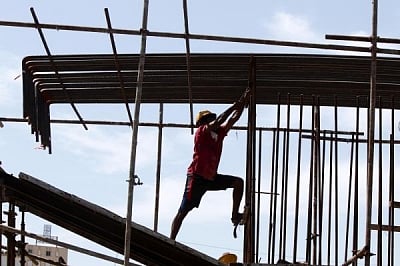 Crores of construction workers reel under misery even as Centre takes measures that go against their interests
