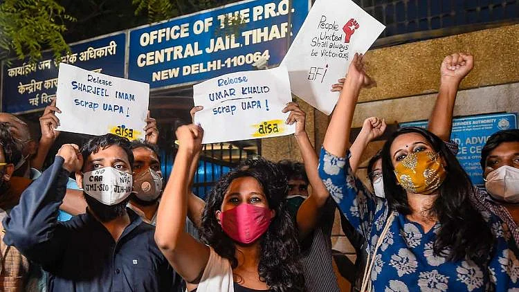 Asif Iqbal, Devangna Kalita and Natasha Narwal after securing bail from Delhi HC