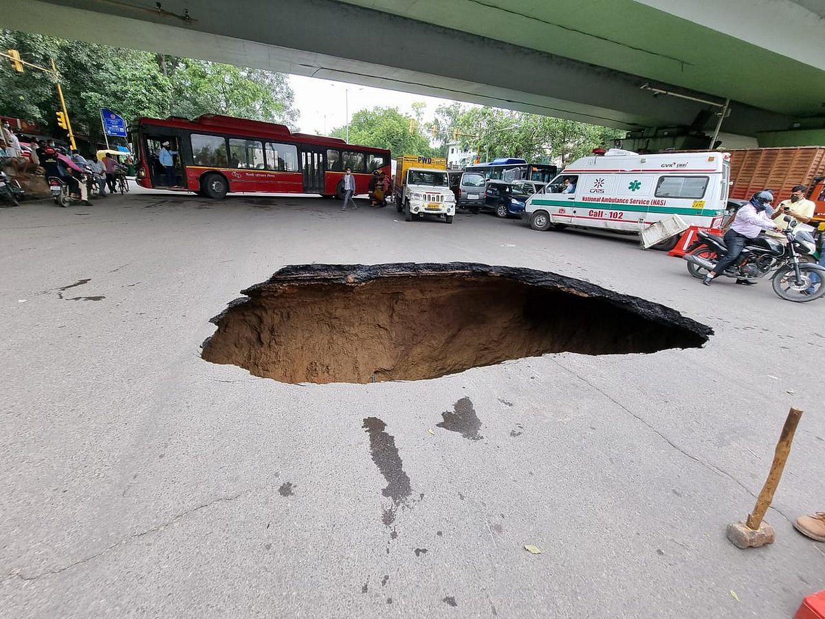 Monsoon woes in Delhi: Portion of road under IIT flyover caves in, traffic affected