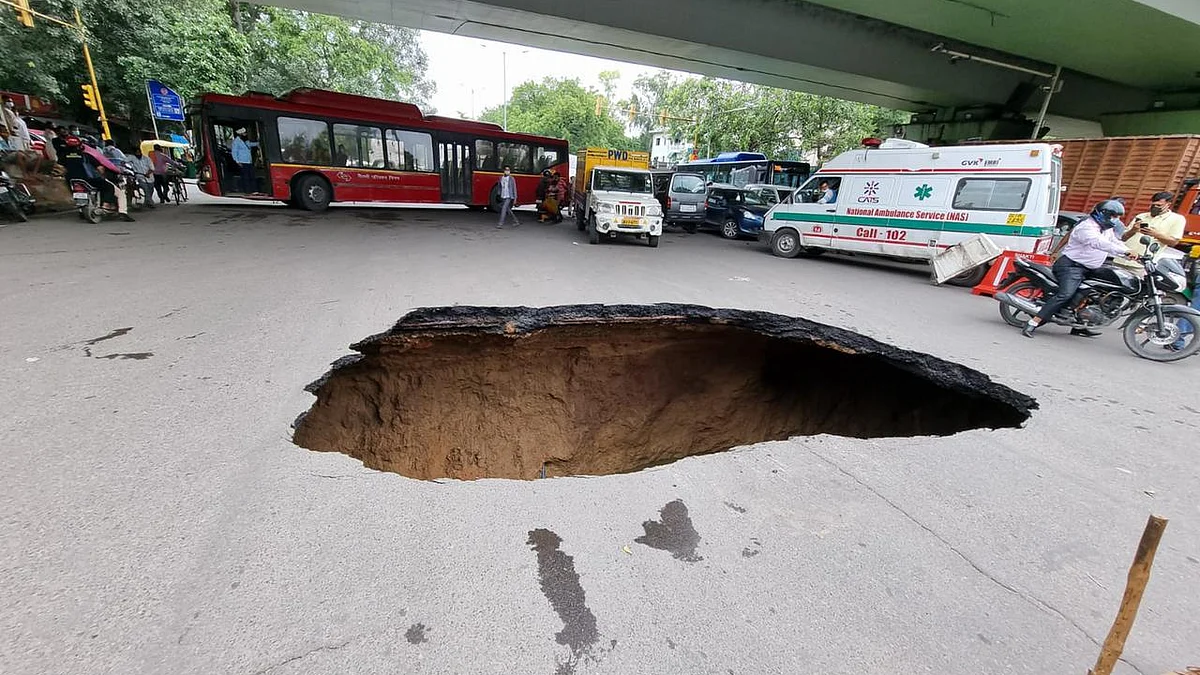 Monsoon woes in Delhi: Portion of road under IIT flyover caves in, traffic affected