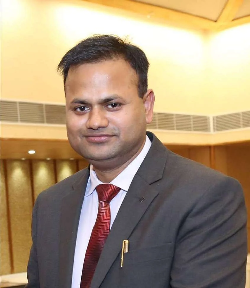 District Magistrate (DM) Ravindra Kumar