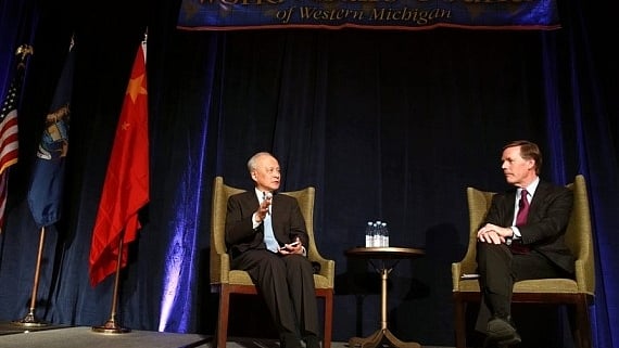 Chinese Ambassador to the United States Cui Tiankai (L) has a conversation with former U.S. Under Secretary of State Nicholas Burns at Grand Rapids, the United States, Feb. 8, 2019