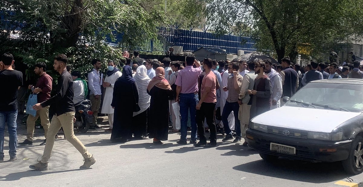People queued outside banks and foreign embassies for cash and visas