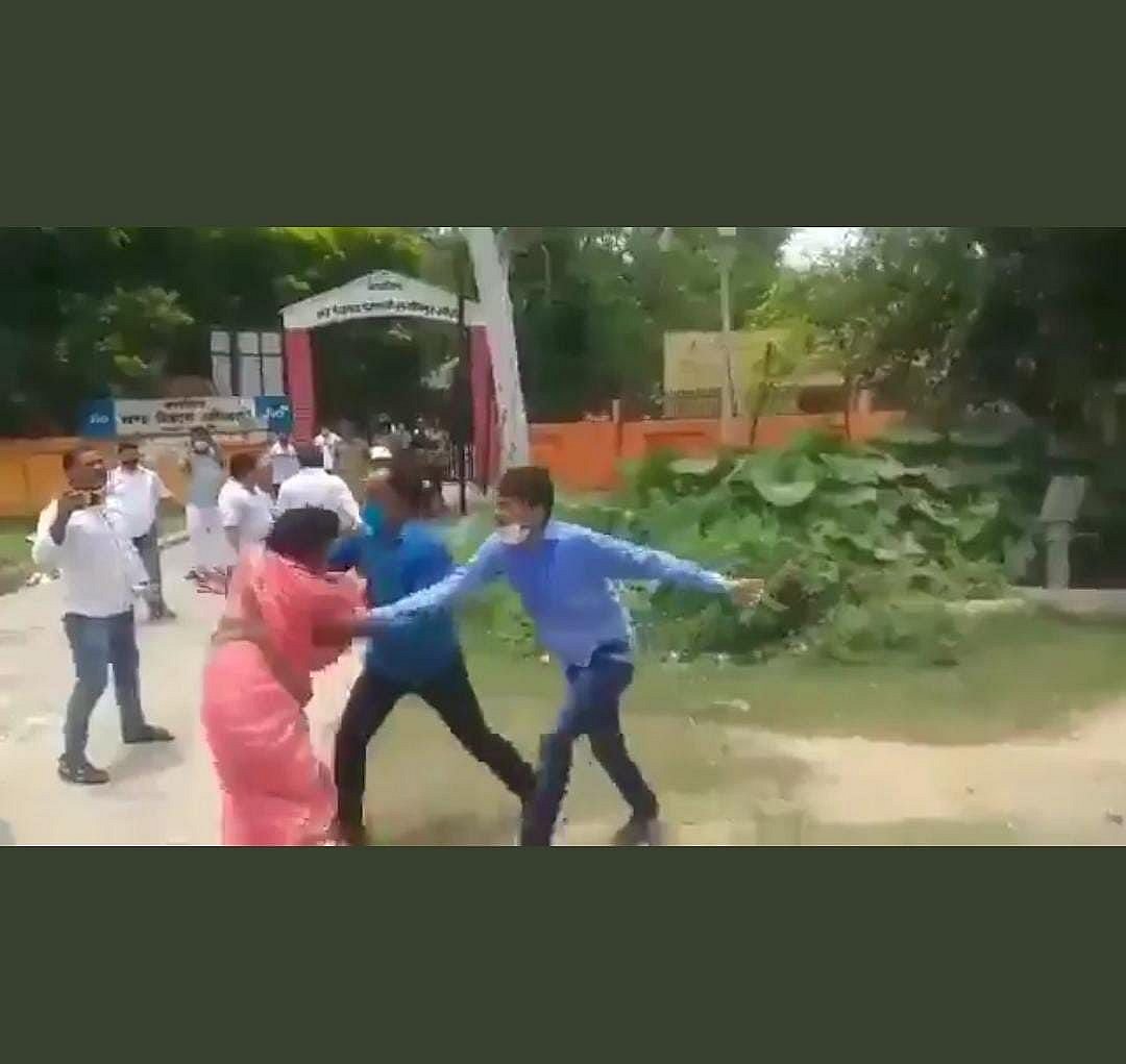 A woman candidate being assaulted in UP's Lakhimpur Kheri during Zila Panchayat polls