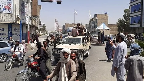 Taliban mark Afghan independence amid chaos, protests and reports of several dead during rally