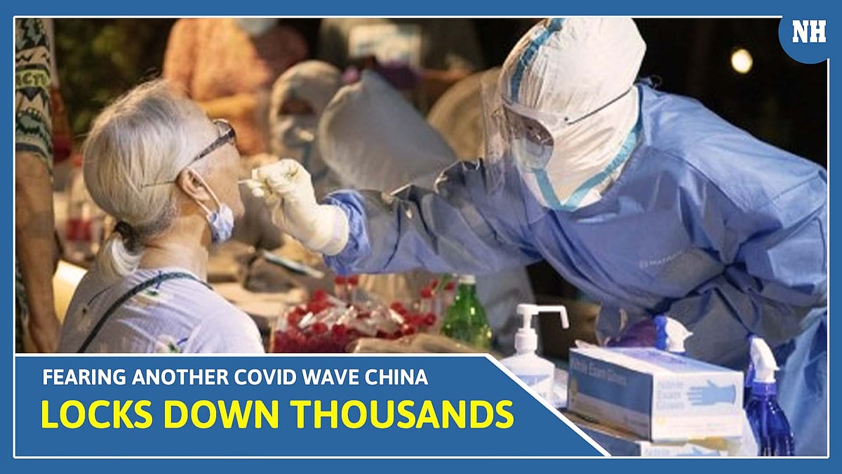 Fearing another Covid wave China locks down thousands 