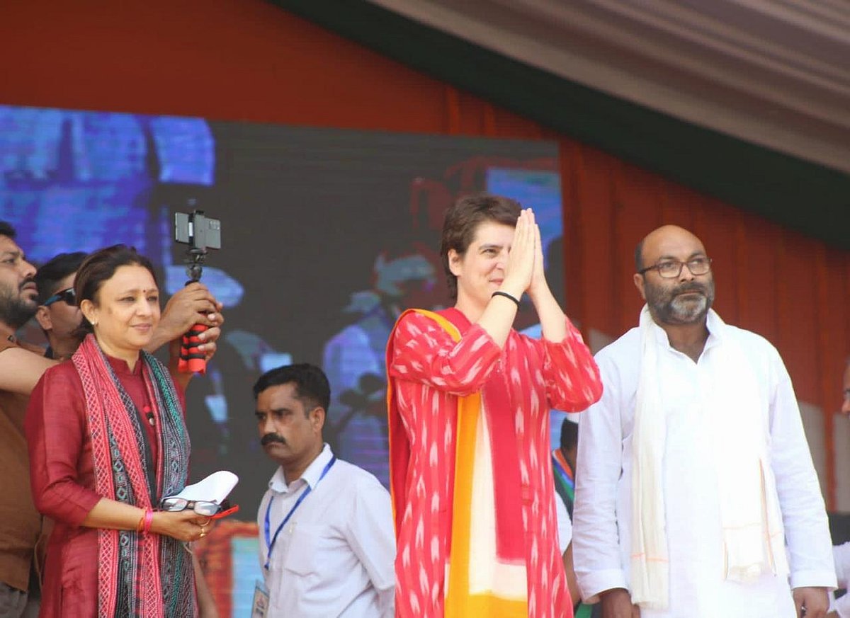 Priyanka Gandhi greets the crowd at the rally