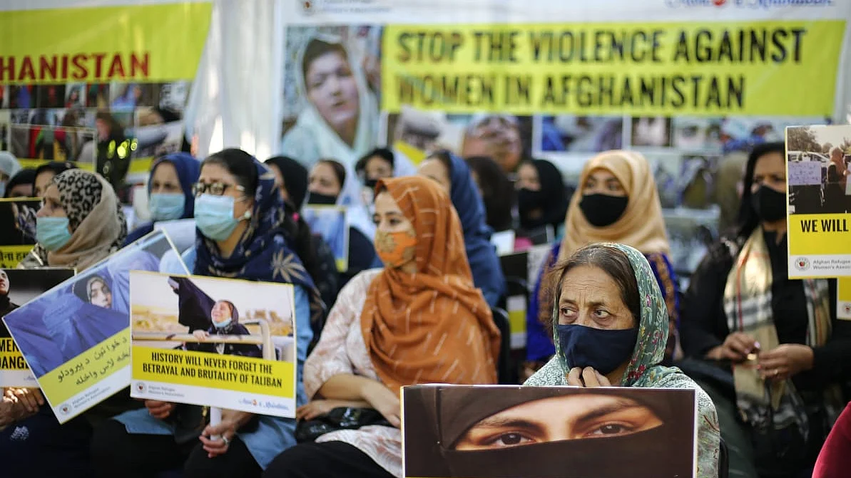 Afghan refugee women protest against atrocities on women under Taliban regime