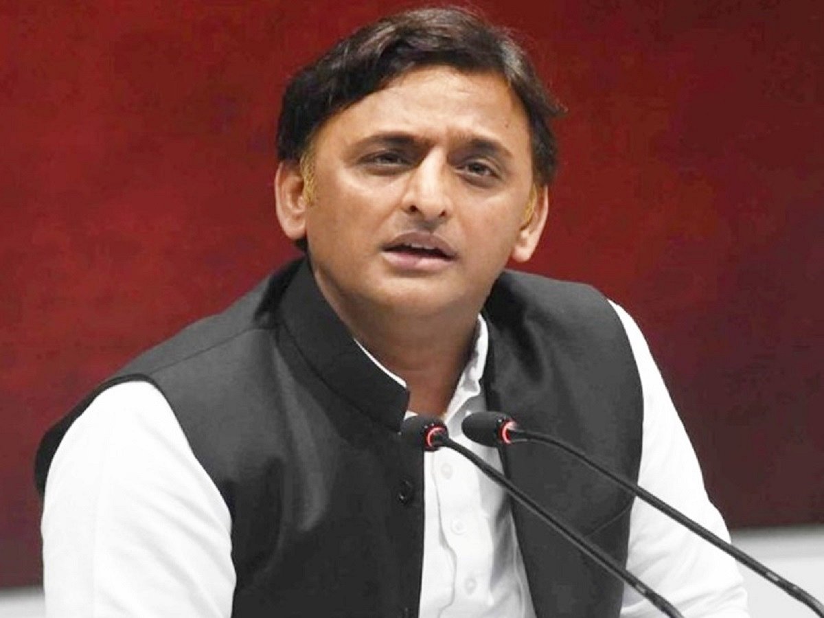 Akhilesh presents SP flag to PSPL founder Shivpal Singh Yadav, indicating possible merger of parties