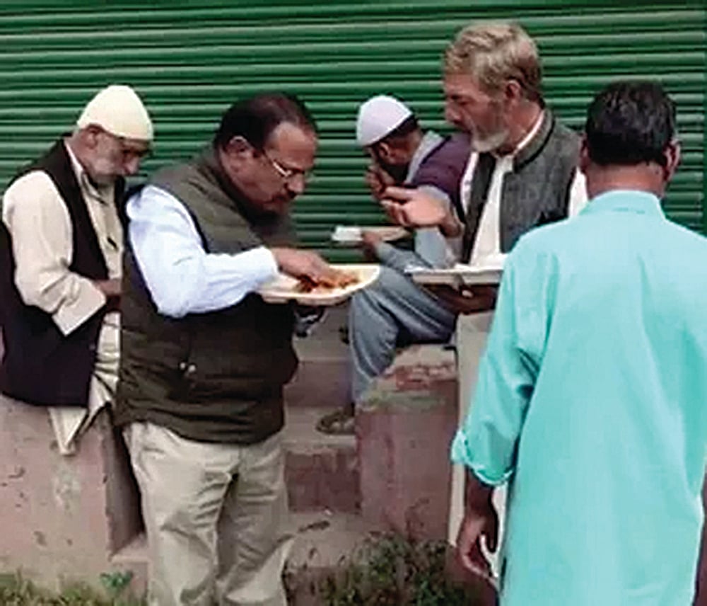 NSA Ajit Doval shares food with some locals in Srinagar in 2019