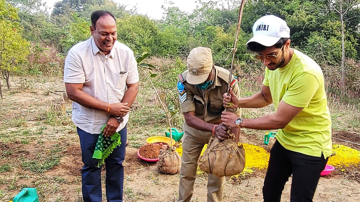 Dulquer Salmaan planting a sapling