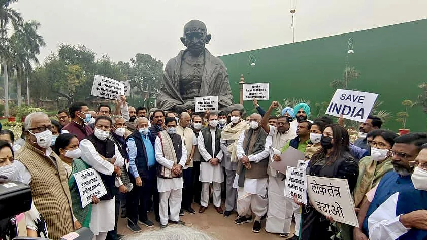 Opposition MPs protesting the suspension of 12 MPs for alleged 'unruly behaviour' in Monsoon session