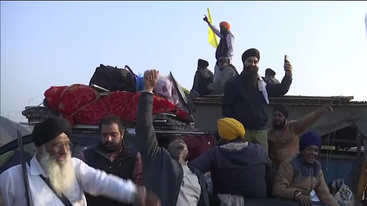 After year-long protest, farmers begin journey back home