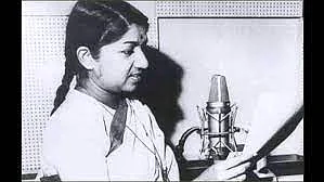 A young Lata Mangeshkar recording a song