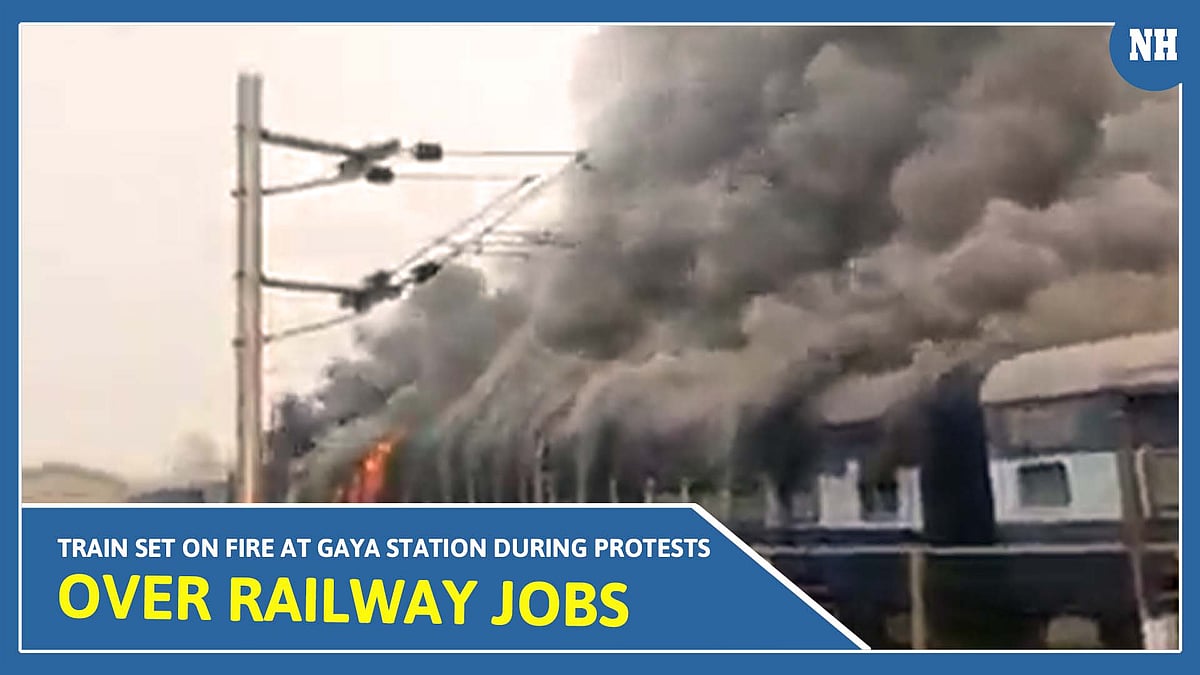 Train set on fire at Gaya station during protests over railway jobs | Video