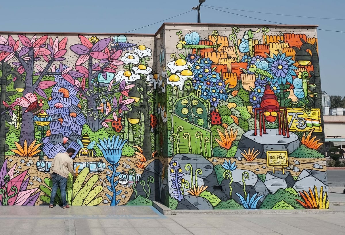 Renowned French artist Mr Poes paints two murals in Delhi symbolizing Indo-French friendship