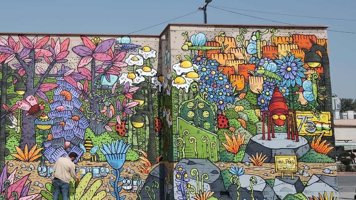 Renowned French artist Mr Poes paints two murals in Delhi symbolizing Indo-French friendship