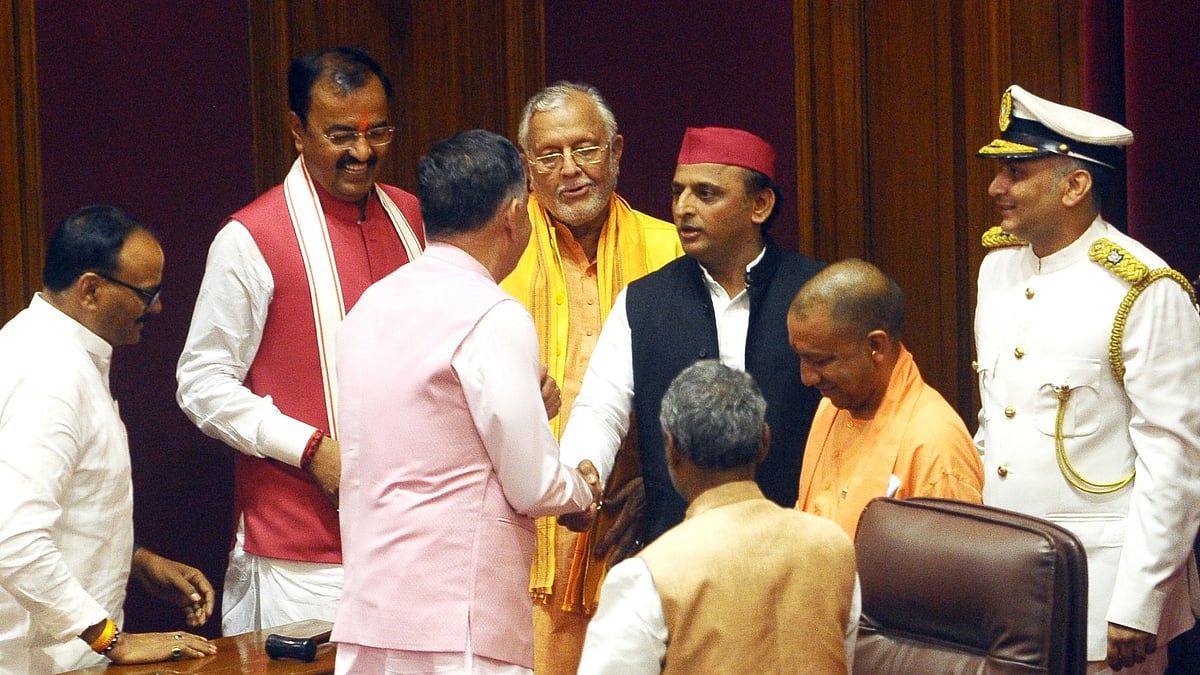 Newly Elected speaker of UP Legislative Assembly Satish Mahana being congratulated by leader of opposition Akhilesh Yadav ,CM Yogi Adityanath 