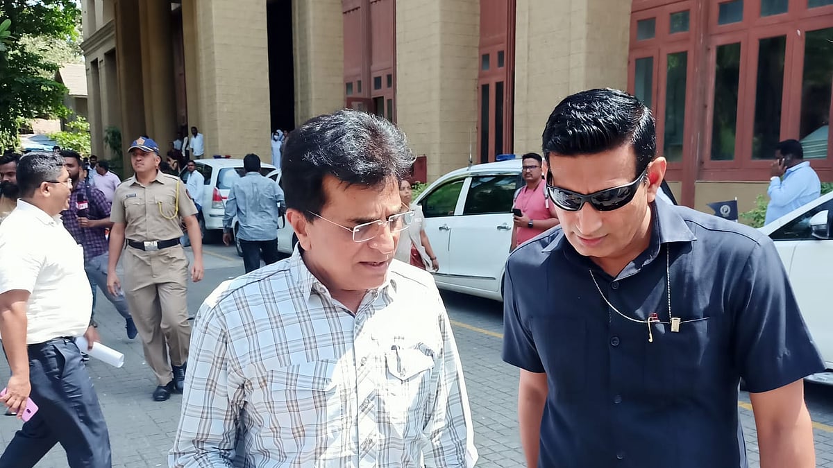 Somaiya (left) leaving the EOW headquarters after appearing for inquiries on Monday.